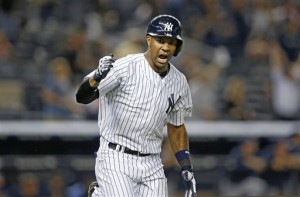 New York Yankees  Chris Young reacts after hitting a ninth-inning, walk-off, three-run home run to lift the Yankees to a 5-4 victory over the Tampa Bay Rays in a baseball game at Yankee Stadium in New York, Thursday, Sept. 11, 2014. (AP Photo/Kathy Willens)
